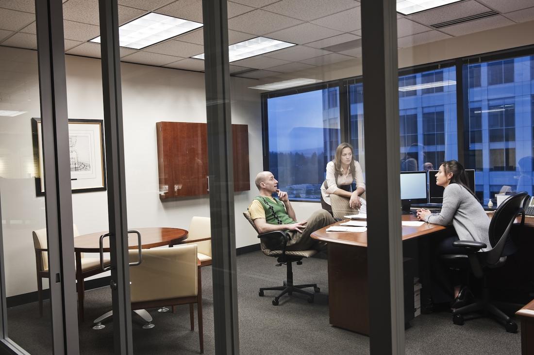 A small advisory team at work in their office