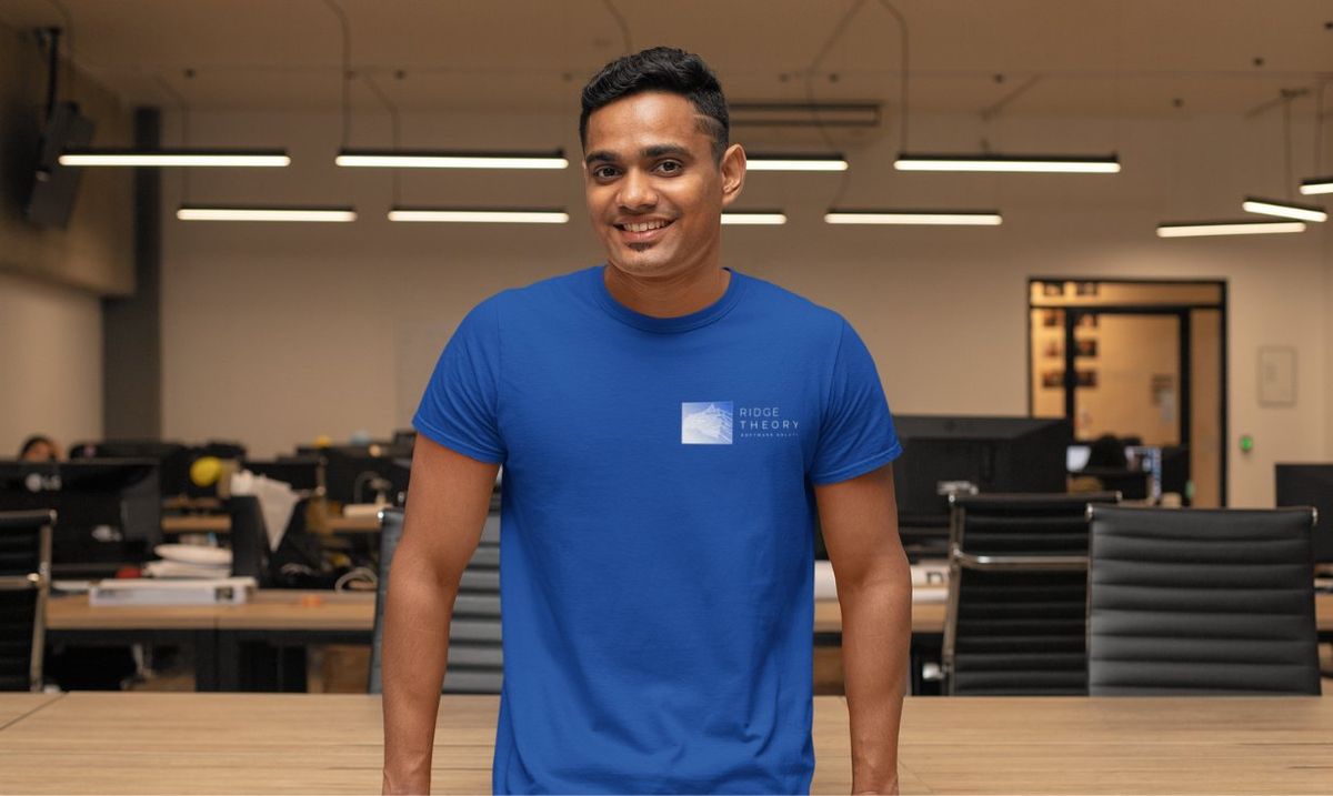 A Ridge Theory team member in branded apparel at the office